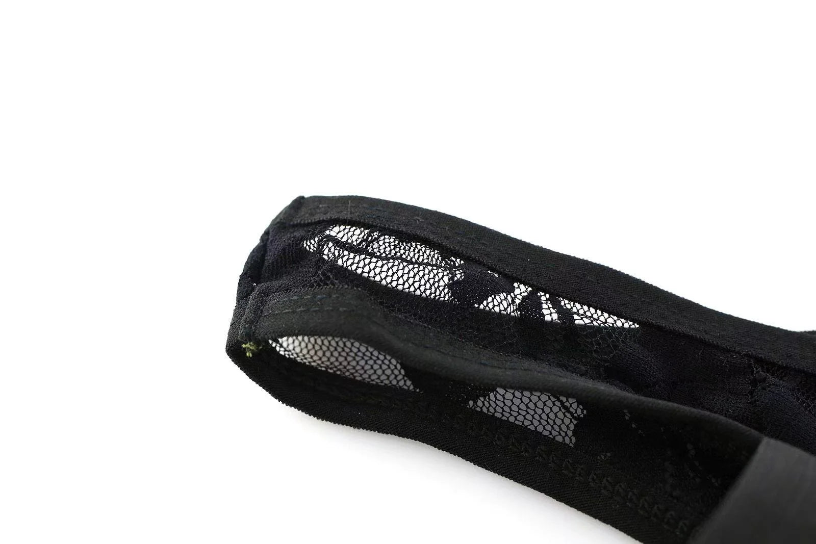 Detailed view of black double strap design on men’s sexy lace thong