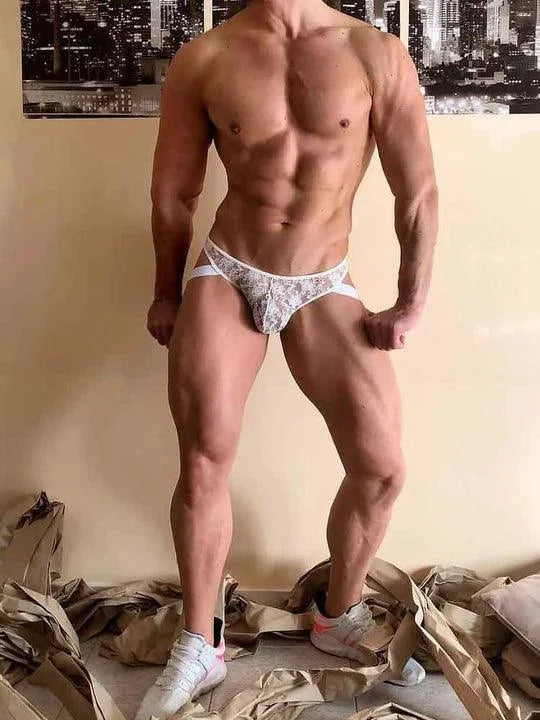 Front view of men’s erotic lace thong side look showing stretch fit and minimal coverage