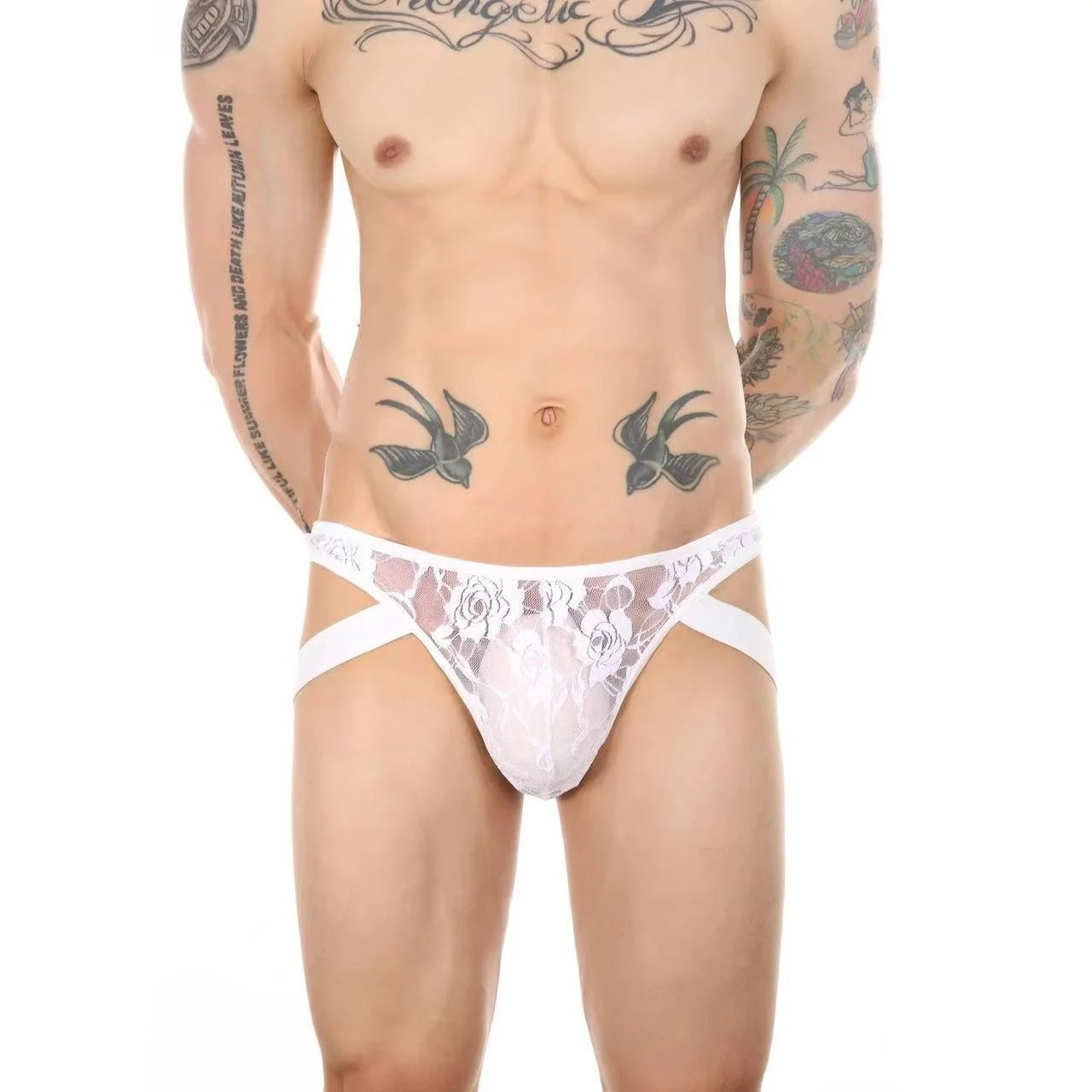 Front view of white men’s lace thong with double straps in black sheer fabric