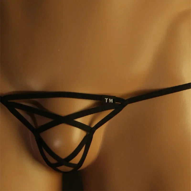 Close-up of thin strap detail on black men’s G-string thong